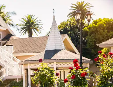 historic district of Tustin California building and red flowers