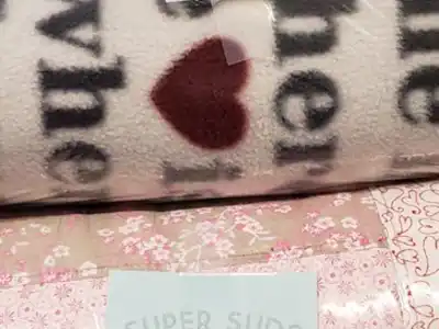 Closeup on blankets in laundry bag