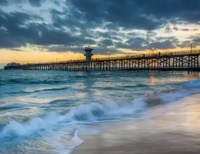 Seal Beach With Pier And Waves